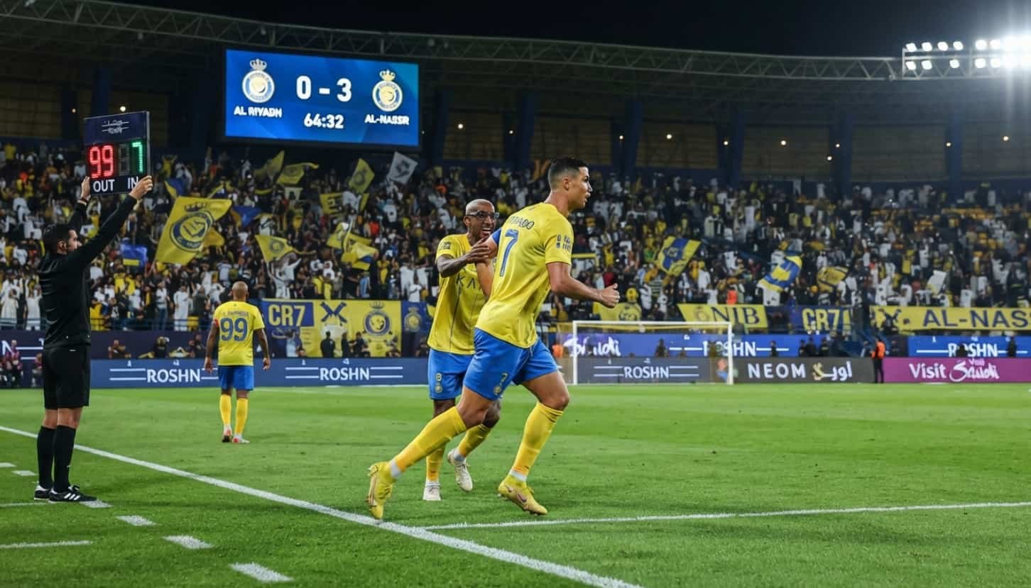Écusson rond rouge et noir du club Al Riyad SC sur fond transparent